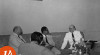 Foto Menteri Luar Negeri Moekarto Nitiwidigdo berbincang dengan dua diplomat senior Amerika Serikat, Mr. John M. Alison (kanan) dan H. Merle Cochran (kiri) dalam misi diplomatik di Kementerian Luar Negeri, Jakarta, tanggal 14 Oktober 1952.